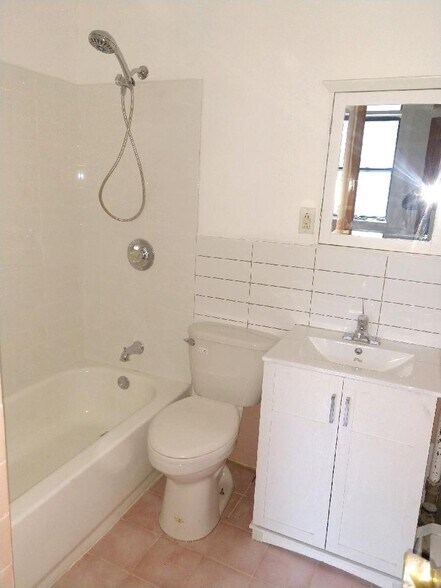 Updated bathroom fixtures - 240 E 23rd St
