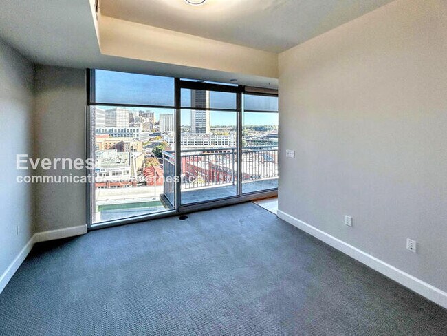 Building Photo - Modern Downtown Richmond 1BR Condo with In...