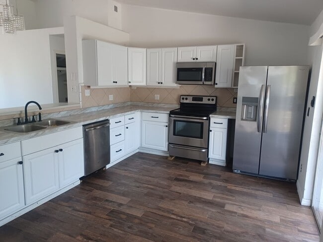 Building Photo - Available Now: 3/2 + den Home On A Quiet D...