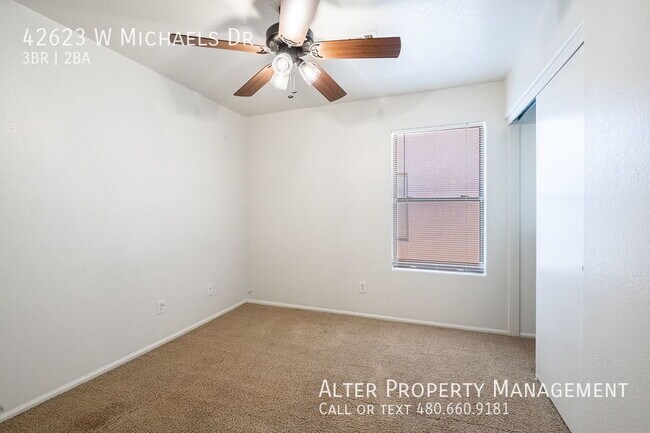 Building Photo - 42623 W Michaels Dr