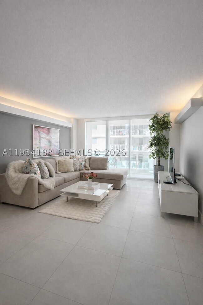 Building Photo - 6917 Collins Ave