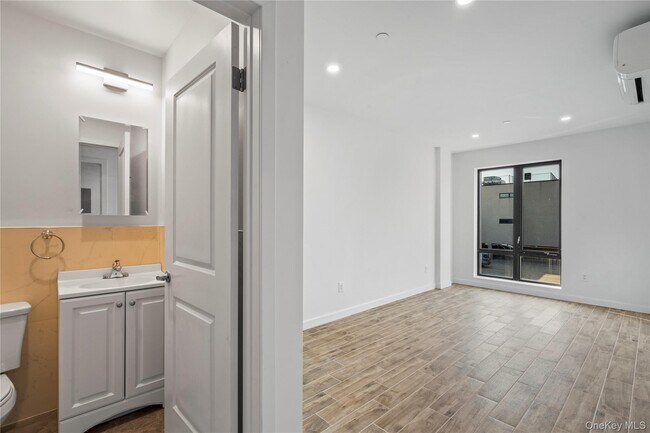 Building Photo - 213-41 38th Ave