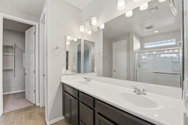 Building Photo - Stunning 4-Bed + Den Eastmark Home with Modern Upgrades Throughout