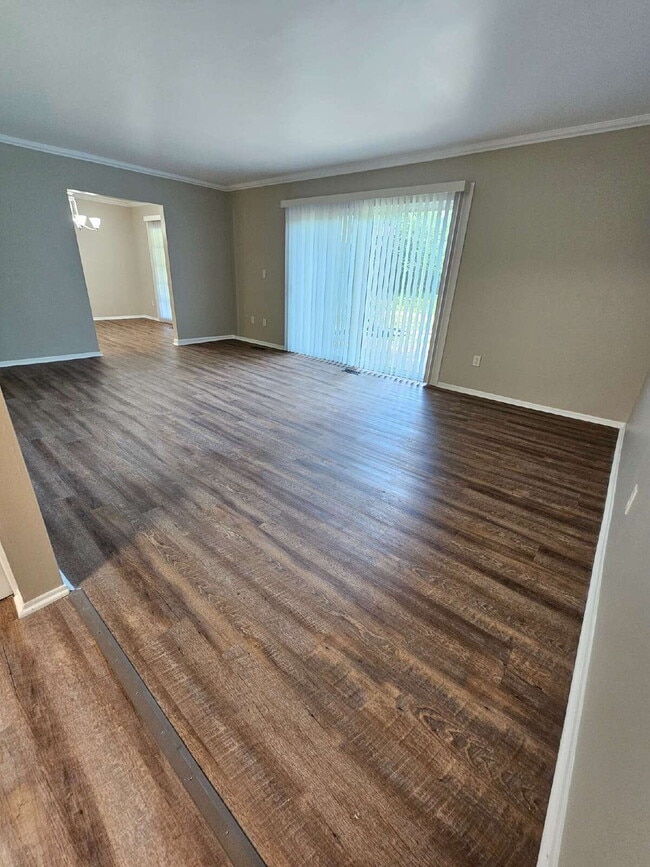 Building Photo - Private 4 Bedroom Home on 0.75 Acres with Great Room Fireplace, Wet Bar & 3-Season Room, 2 Car At...