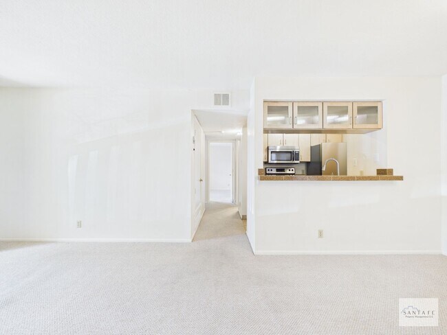 Building Photo - Two Bedroom Second Level Condo Available Now!