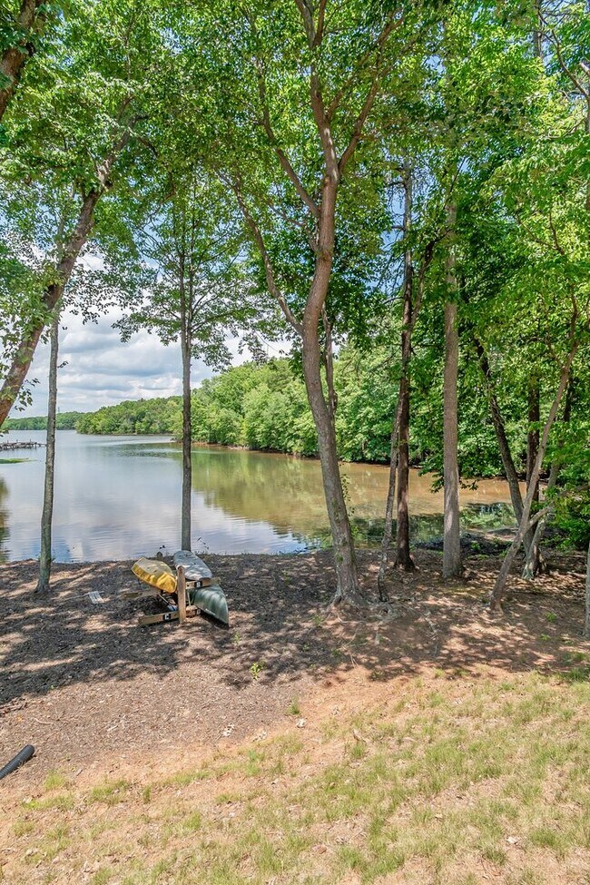 Building Photo - Waterfront Living at Its Finest - Beautifully Remodeled 3BR/2BA, 1st Floor, End Unit Condo on Lak...