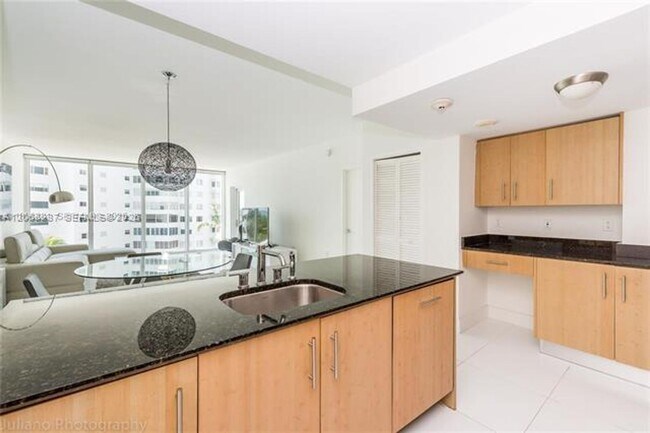 Building Photo - 10275 Collins Ave
