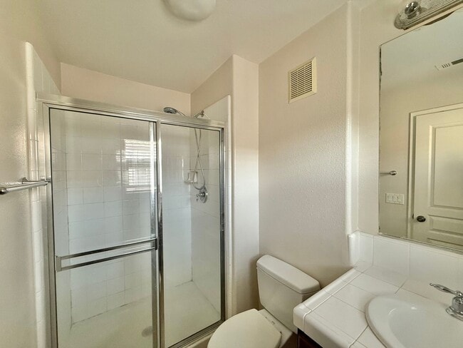 Building Photo - Two Bedroom Suite Townhome and Includes a Garage and Laundry!