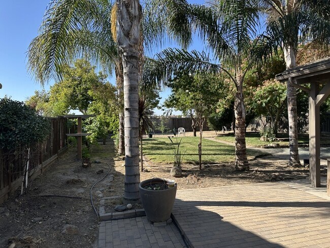 Building Photo - This stunning corner home offers 4 spaciou...