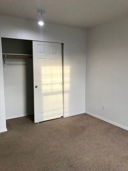 Bedroom 2 with large closet - 1552 SE Ripplewood Ave