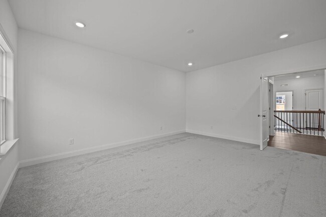 Building Photo - Brand-New 5BR/4BA in Knightdale’s Stoneriver – Luxury Living with 3-Car Garage