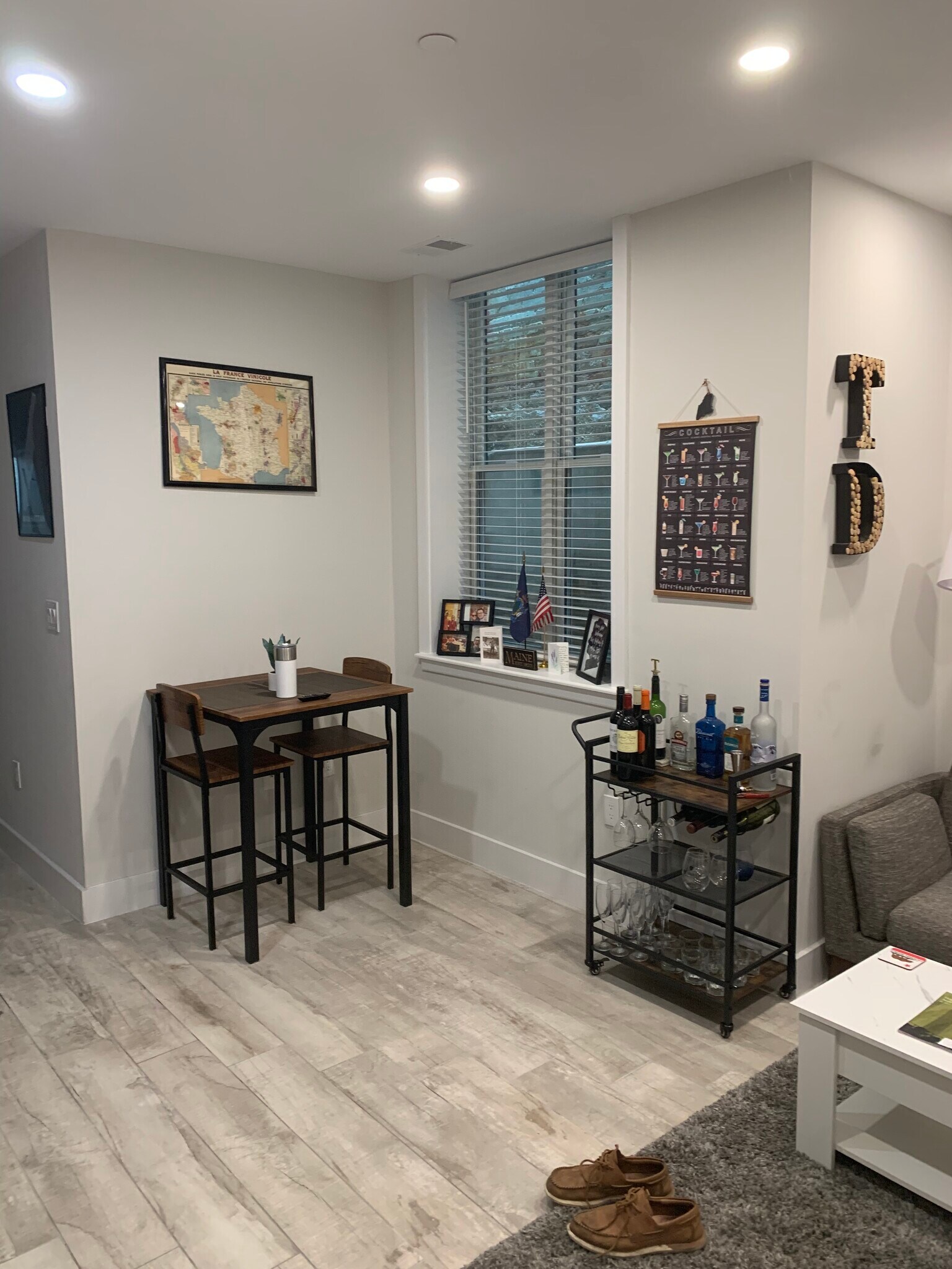 Dining area with bar cart and high top table. - 2556 University Pl NW