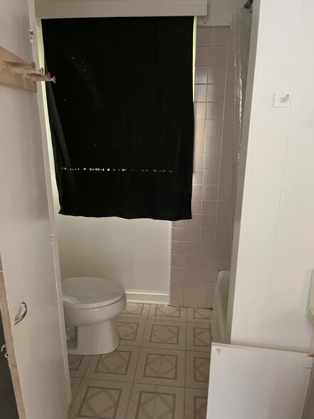 Bathroom from hallway - 220 Nichols St