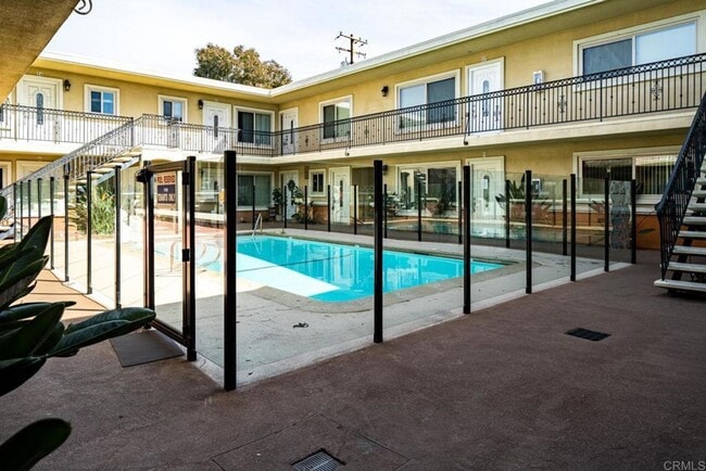 Building Photo - Prime Location! Pet-Friendly 1-Bedroom Condo Near Beach & Naval Bases