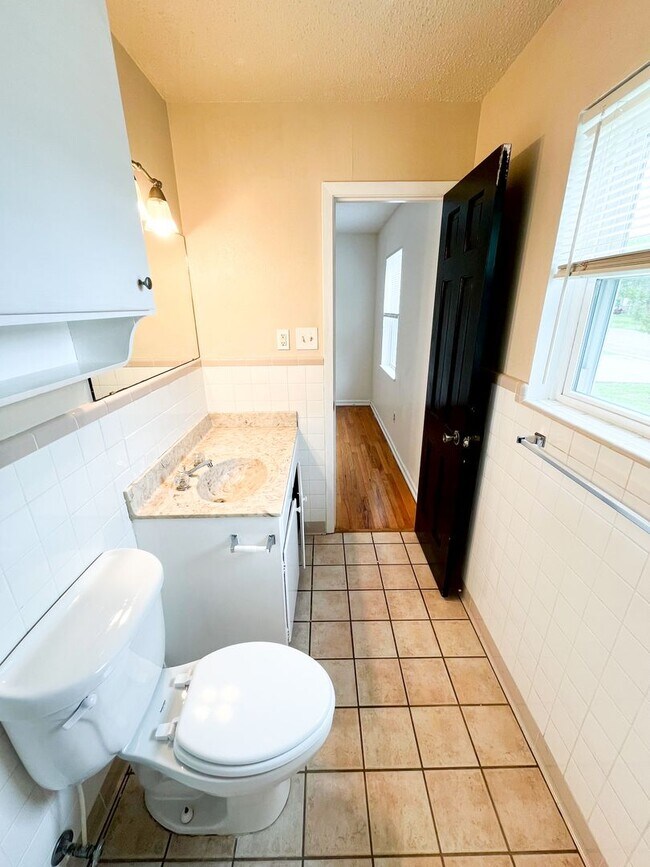 Building Photo - Available Now!!!! Gorgeous 3 bedroom, 2 bath, 2 car garage home. Beautiful wood look flooring. Sp...