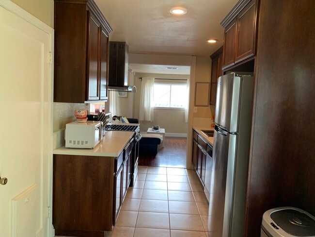 Walk through to the kitchen nook and enjoy your meals - 5842 Belleau Wood Ln