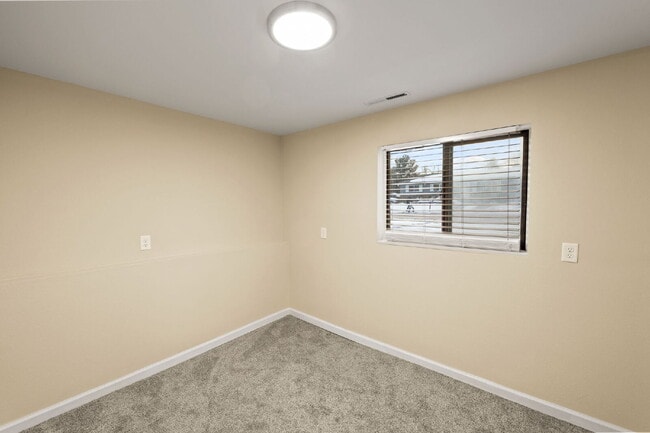 Building Photo - Spacious Split-Level Home with Finished Basement, Deck, Fenced Yard & 2-Car Garage