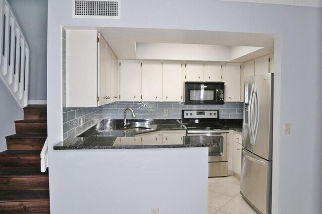 Building Photo - 3935 Village Dr