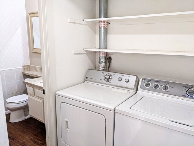 Downstairs Half Bathroom and Laundry - 7823 Tommy Dr