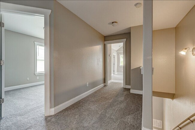 Building Photo - Welcome to this stunning 4-bedroom, 2.5-ba...