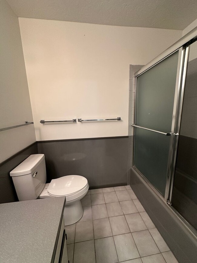 Building Photo - Spacious, three level, 4 Bed 2.5 bath Townhome in Ammon right behind the Walmart on Hitt.