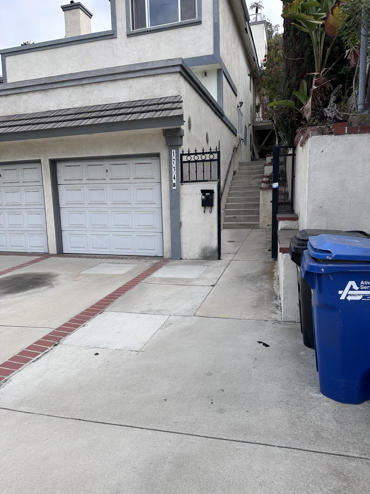 Front entrant and parking spot - 1734 Prospect Ave