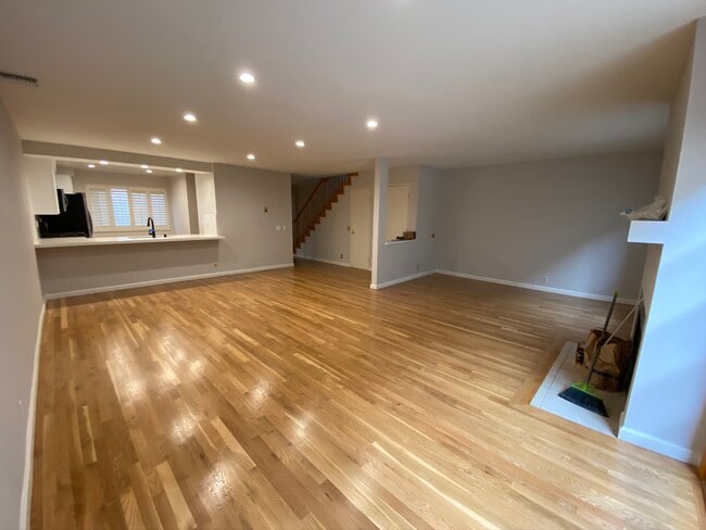 Living room with newly refinished hardwood floors - 2022 Delaware Ave