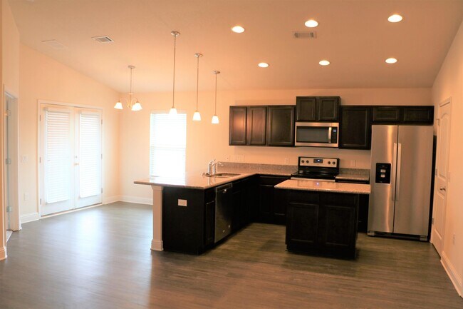 Building Photo - 6393 Redberry Dr