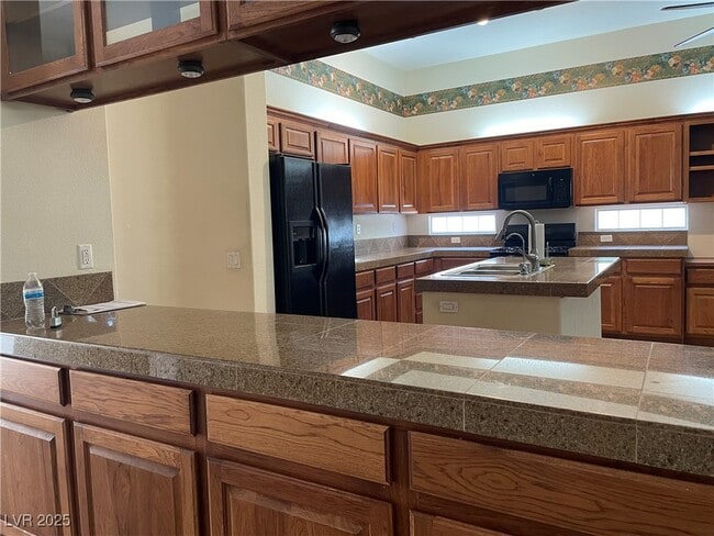 Building Photo - 8216 Romantic Sunset St