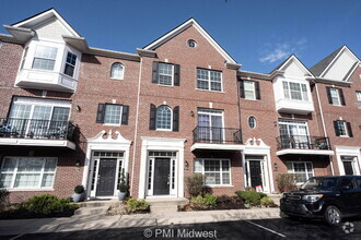 Building Photo - "Charming 2-Bed Townhouse Retreat with Har...