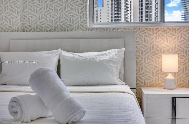 Building Photo - 19370 Collins Ave