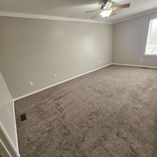Building Photo - 2 Bedroom, 1.5 Bath Townhouse w/ Garage & Huge Master Bedroom. Full Sized Washer & Dryer In Unit.