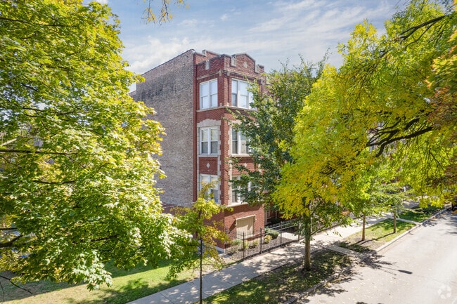 Building Photo - 6211-6221 S Vernon Ave