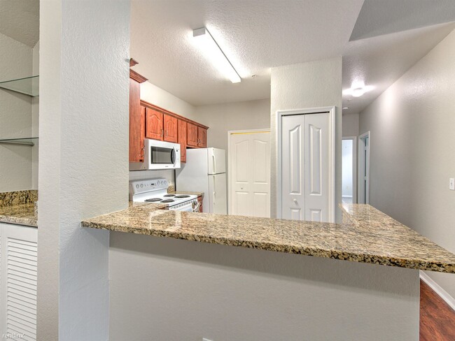 Building Photo - 2 br, 1 bath Condo - 5703 Legacy Crescent ...