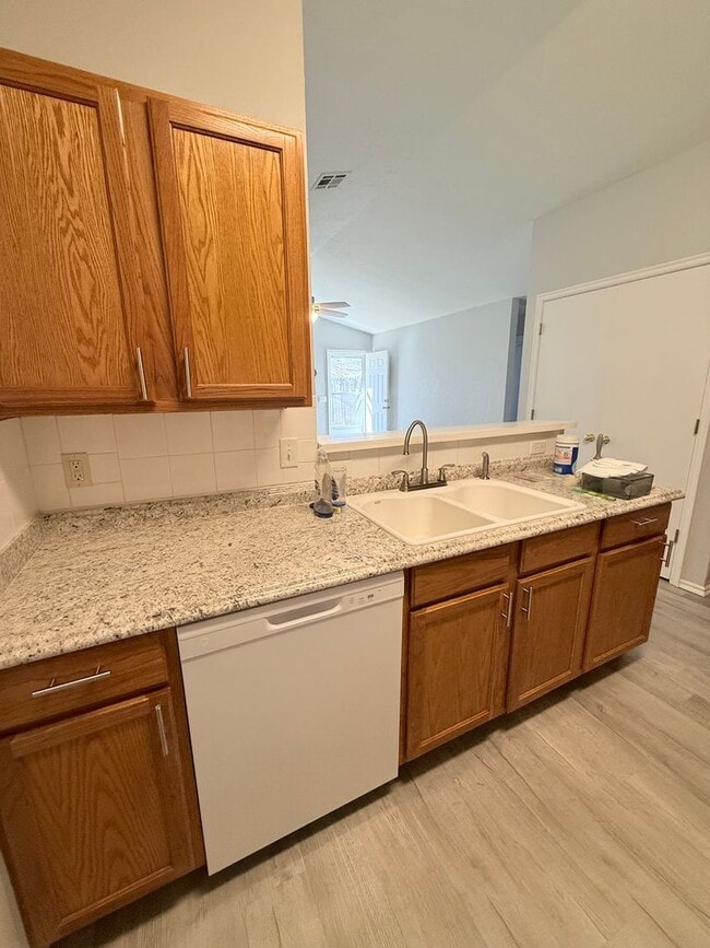 Building Photo - 4 Bedroom - 2 bath duplex located near campus and State Highway 9