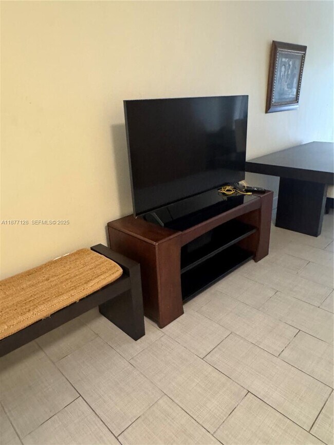 Building Photo - 6494 Collins Ave