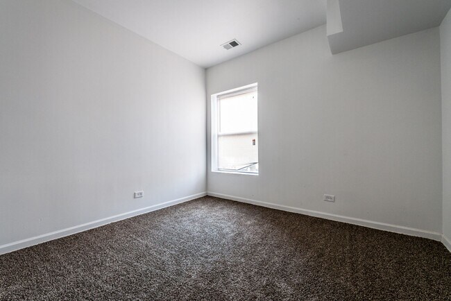 Building Photo - 10901 S Vernon Apartments