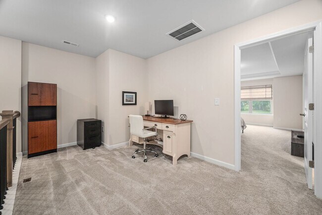 Building Photo - Stunning 3BD, 2.5BA End-Unit Fuquay-Varina Townhome with a 2-Car Garage in a Prime Location Near ...