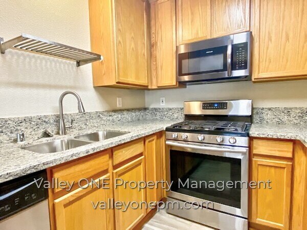 Building Photo - COMING SOON! Private Ground Floor Townhome in Desirable Complex with Attached 2 Car Garage