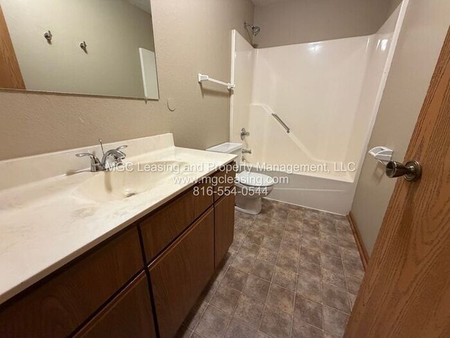 Building Photo - Millwood Townhomes & Apartments: 2nd Floor with Private Entrance - Choose Your Bonus: a Brand-New...