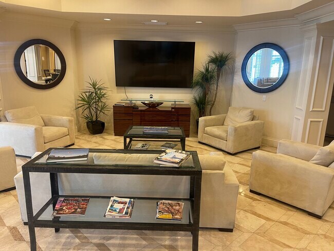 Tv room with wet bar off lobby - 2745 1st St