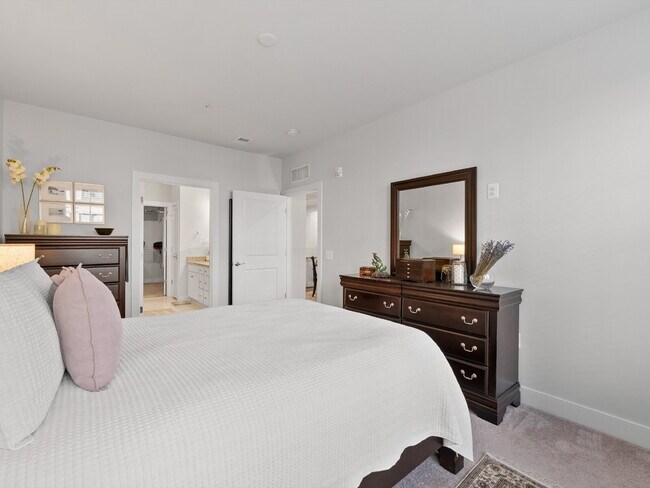 Building Photo - Discover Modern Comfort at Wind Charm Street