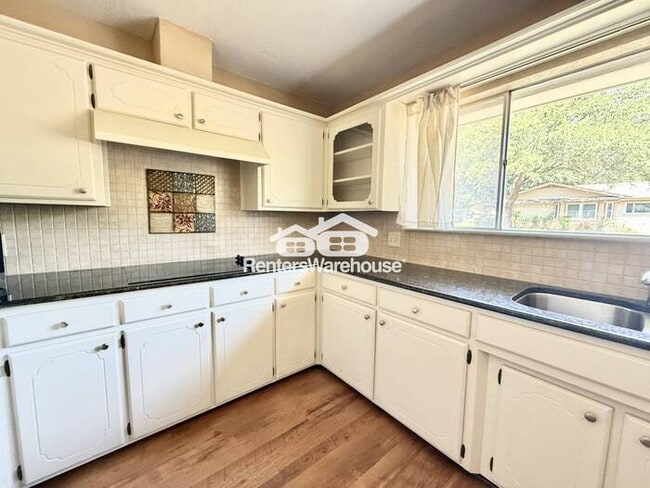 Building Photo - Spacious Corner-Lot Home with Cozy Charm a...