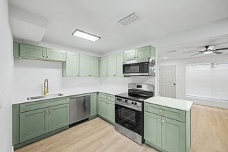 Building Photo - Spacious 2 Bed + Bonus Room | Large Private Yards | Covered Parking | 8 Weeks Free Rent!
