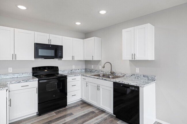 Building Photo - 3 bedroom duplex with a fully fenced yard-Westbury Gardens!