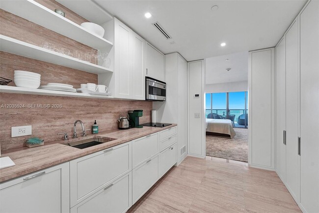 Building Photo - 9703 Collins Ave