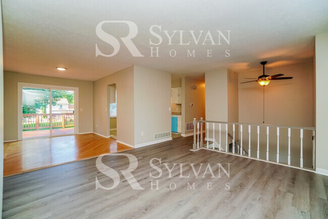 Building Photo - The living is easy in this 3 bedroom, 2.5 bathroom home