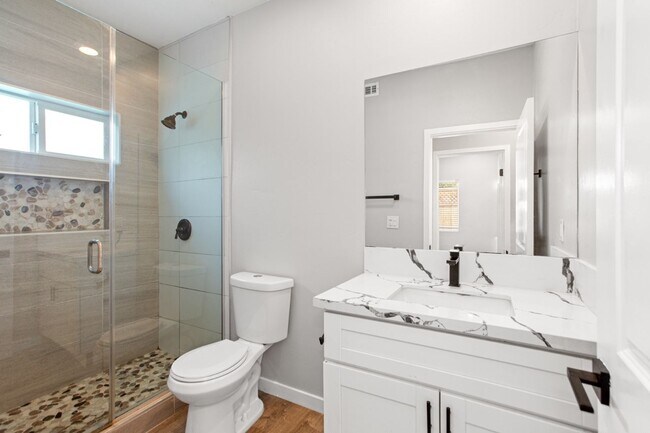 Building Photo - Private balcony + private patio!