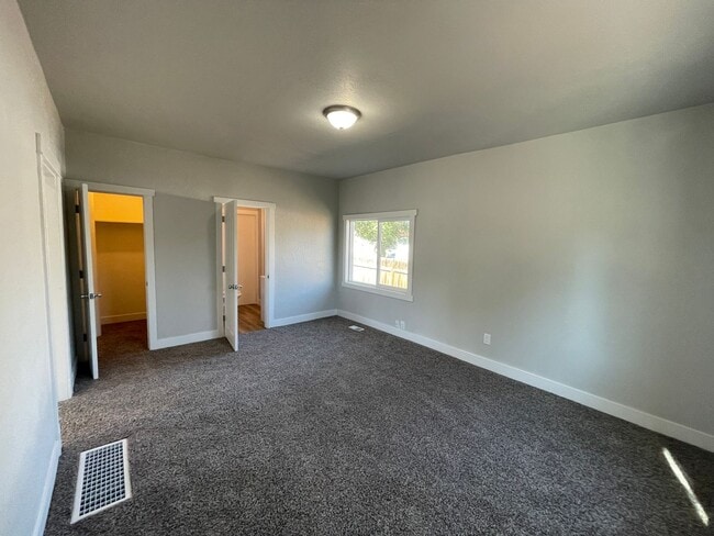 Building Photo - Spacious 4 Bed, 2 Bath Home with 2-Car Garage in Magna