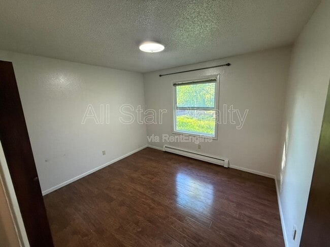 Building Photo - 5701 E 98th Ave